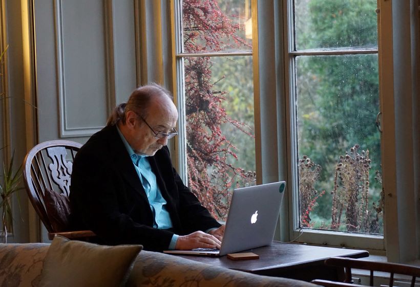 The Grey Pound older man using laptop